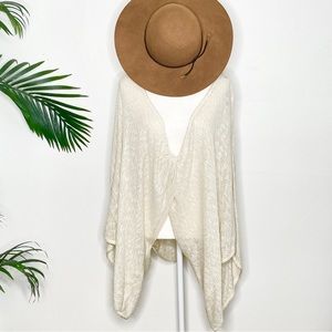 New York & Company twist back/ front top. 
Open weave. Lightweight. Bell sleeve.